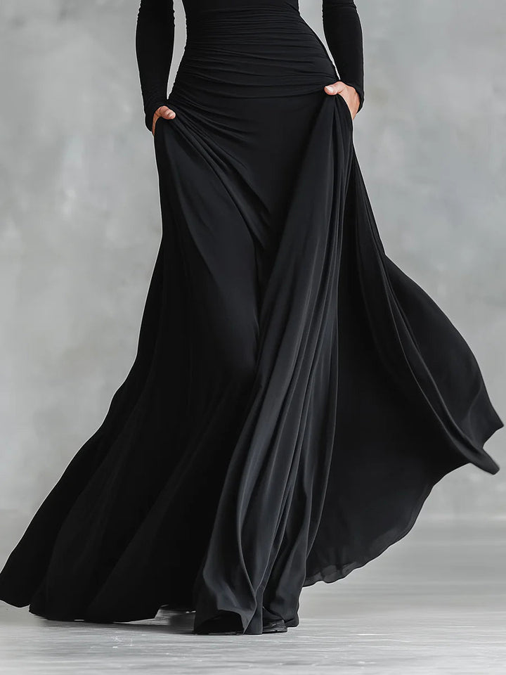Etna | Modern long dress in black crepe with boat neck and pleats