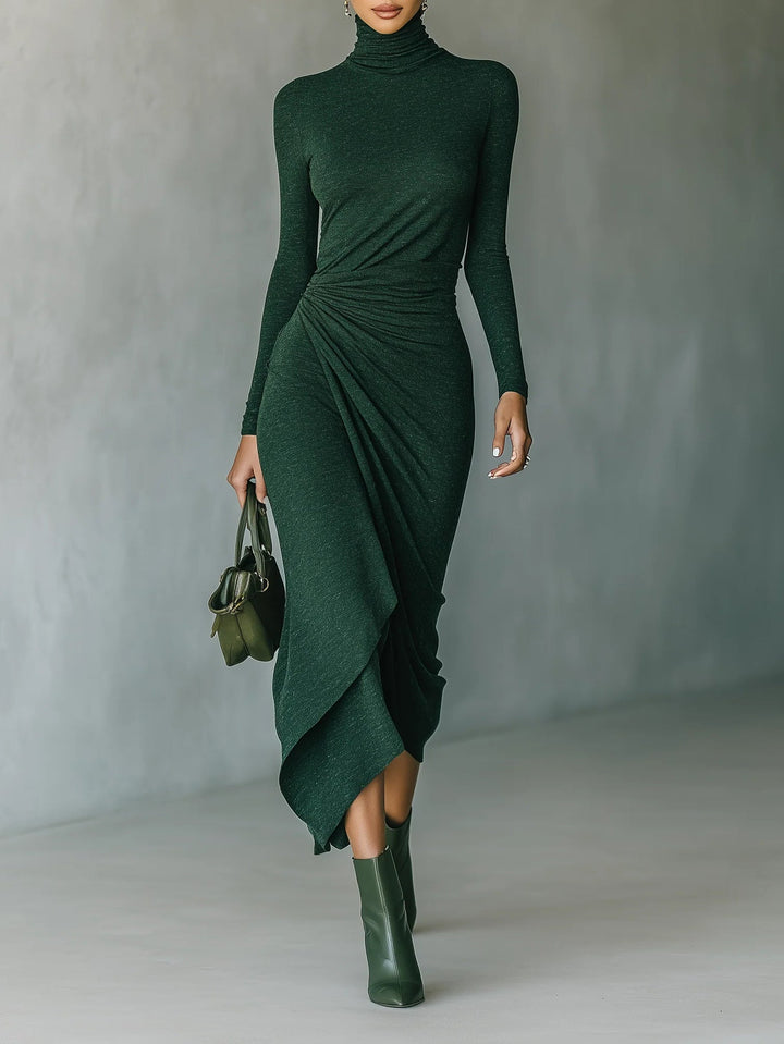 Aislinn | Dark green asymmetric midi dress with wrap details, pleats, and high collar