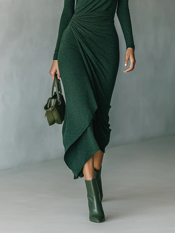 Aislinn | Dark green asymmetric midi dress with wrap details, pleats, and high collar