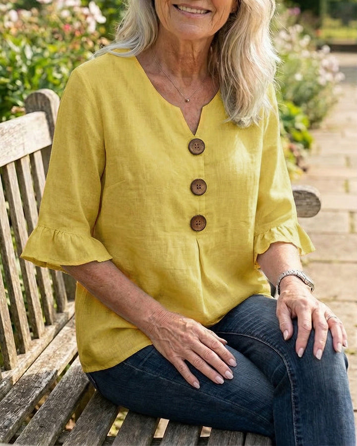 V-Neck Blouse with Wooden Buttons and Ruffled Sleeves